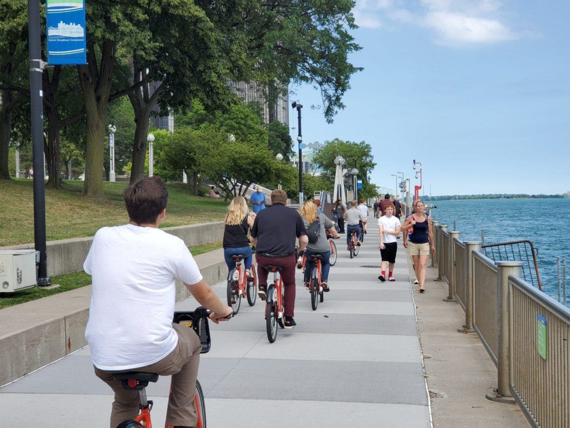 PEA Interns biking on the riverfront.